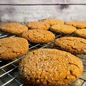 baked ginger snaps on a baking rack