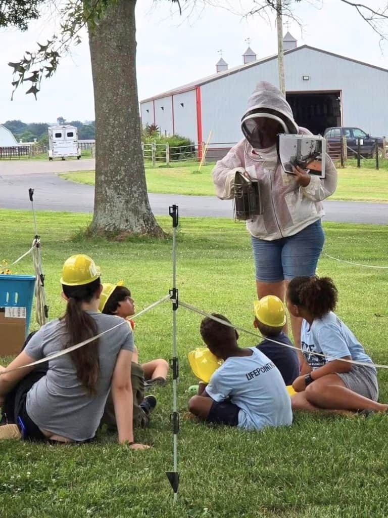 Barbra-Sue teaching children about bees
