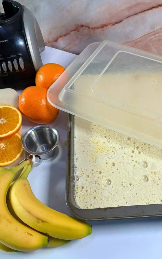prepared punch ready to be put into freezer in a covered 13x9 pan