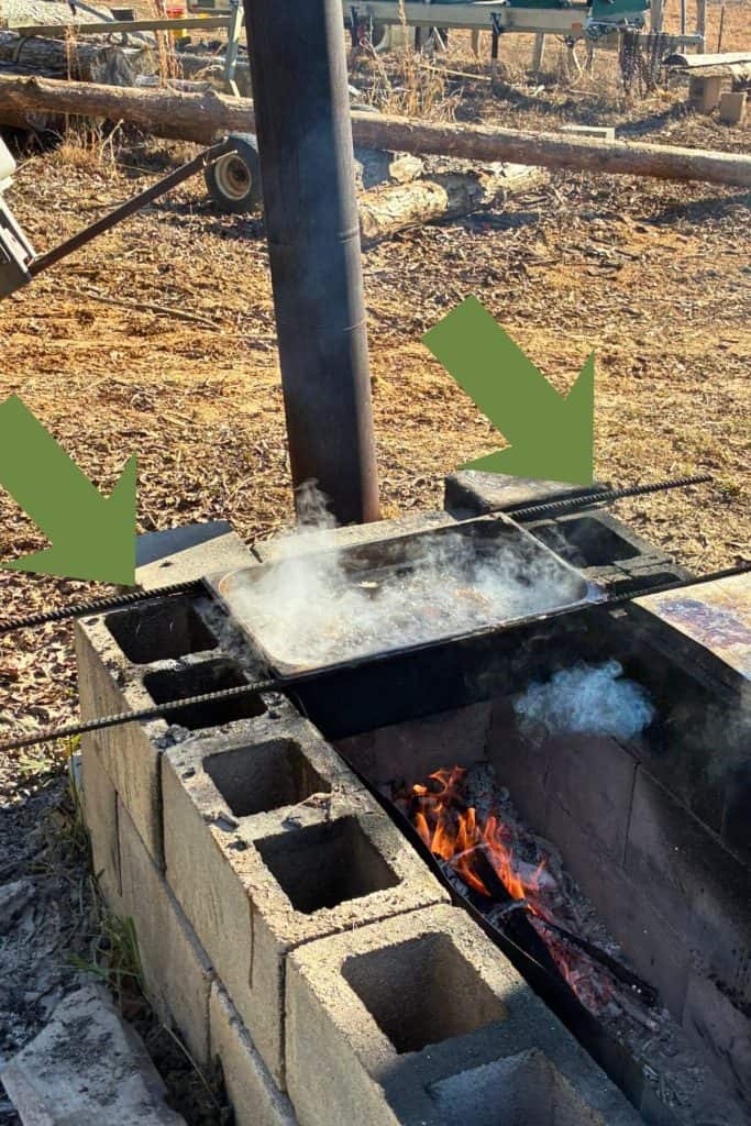 Long handles on boiling pan labeled
