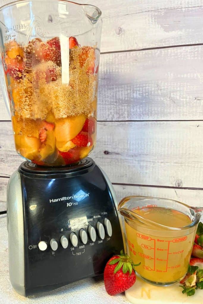 fruit in the blender with sugar