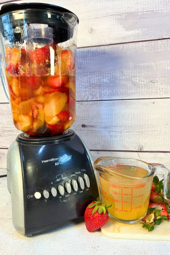 fruitin the blender that has set for 15 minutes, notice extra juice