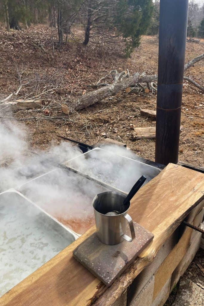 boiling maple sap over an open fire