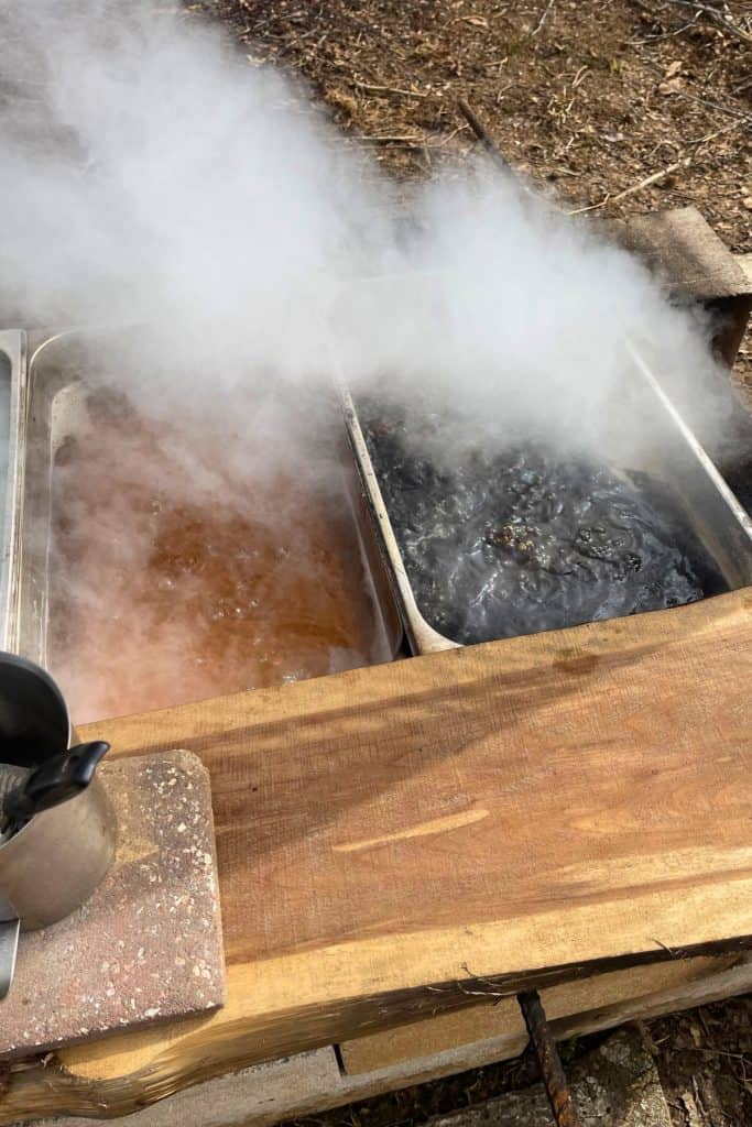 maples sap boiling in pans
