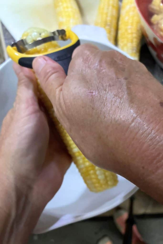 using corn stripper
