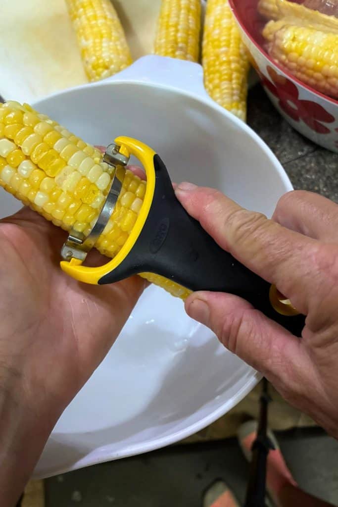 using corn stripper