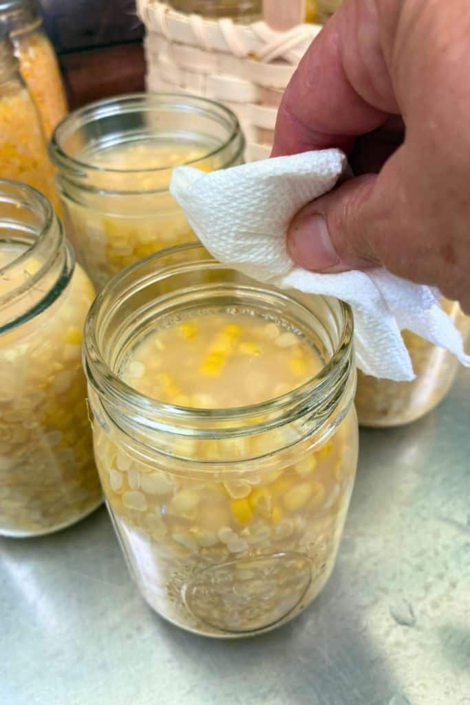 clean rim of jar