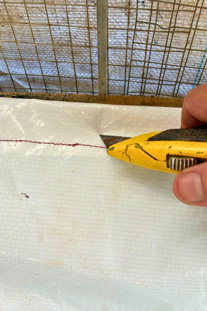 cut slit through poop hammock to secure